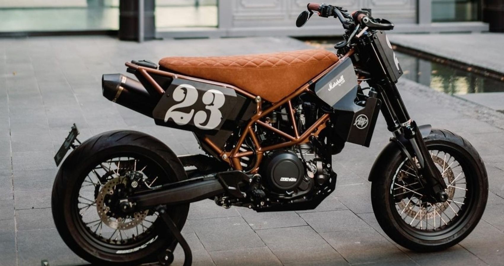 Side view of the customized KTM 690 SMC-R by AMP Motorcycles