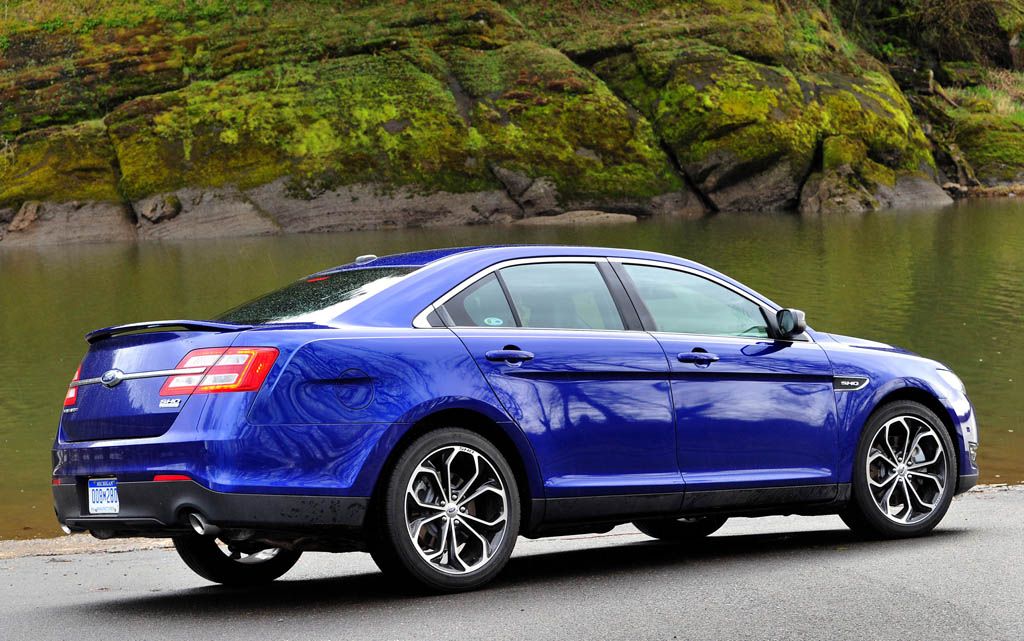 Blue 2012 Ford Taurus SHO on the road
