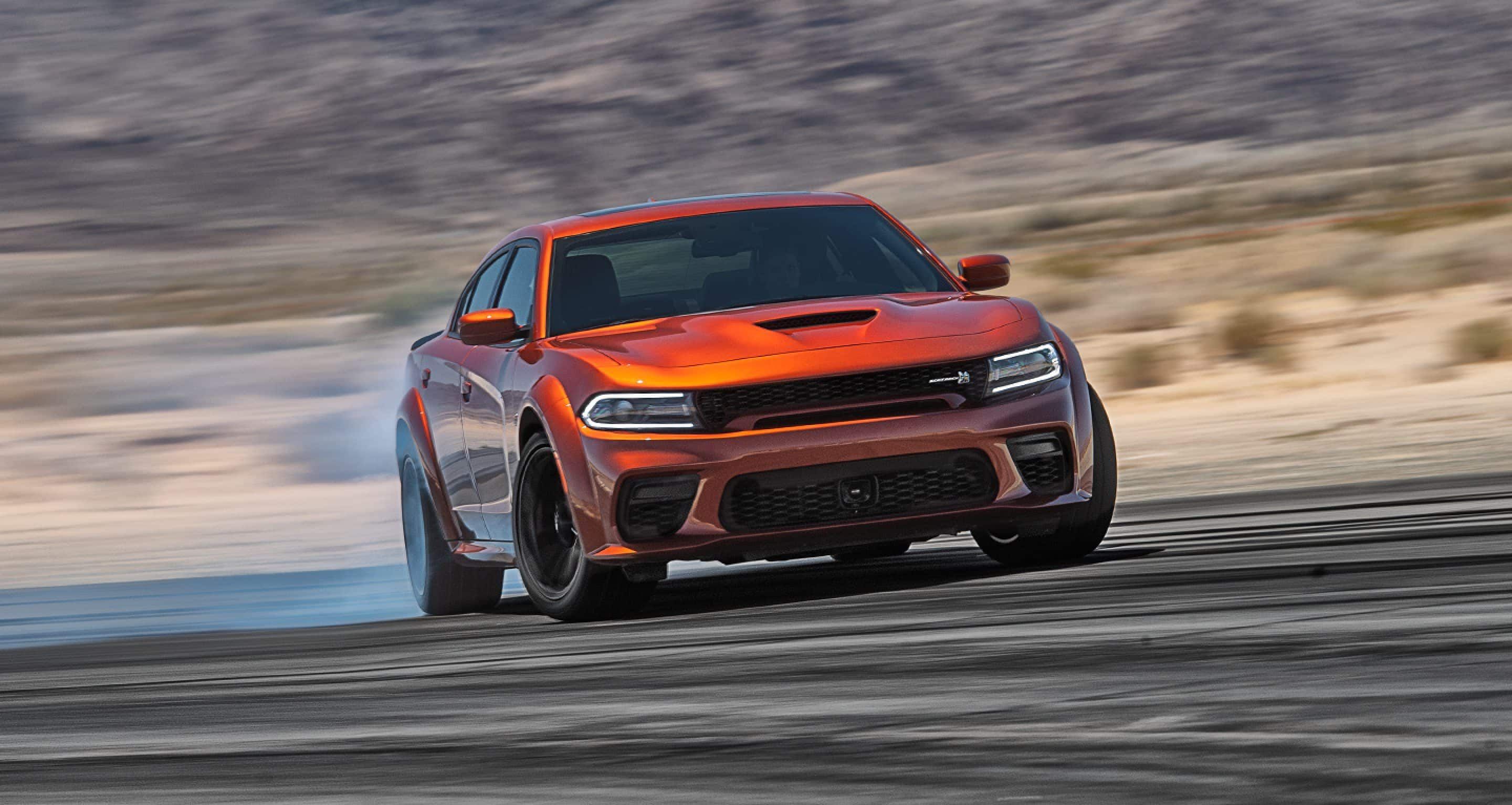 The 2022 Dodge Charger SRT Hellcat Redeye Widebody drifting on the track. 