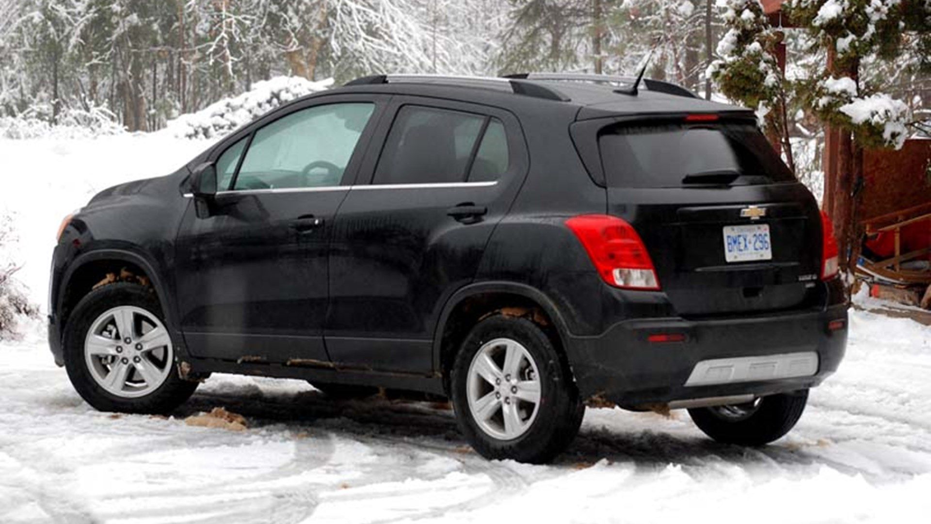 Black Chevrolet Trax on a snowy road