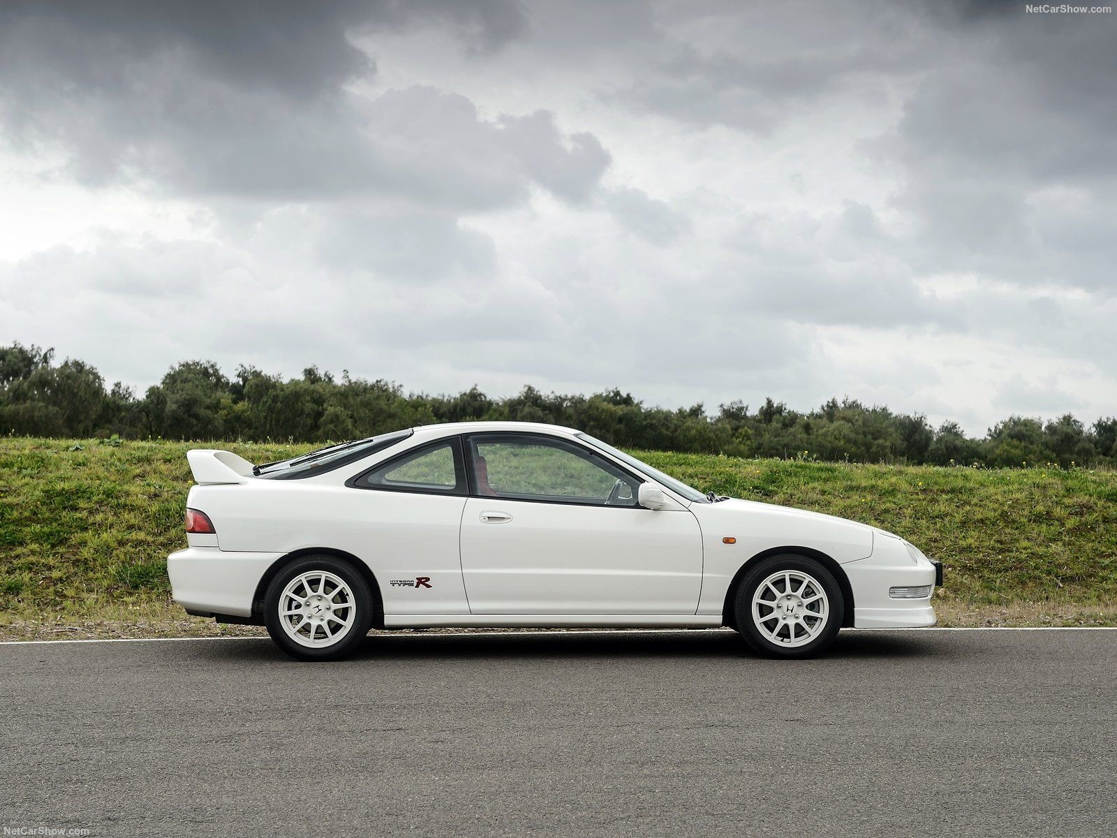 Honda Integra, white, side profile view