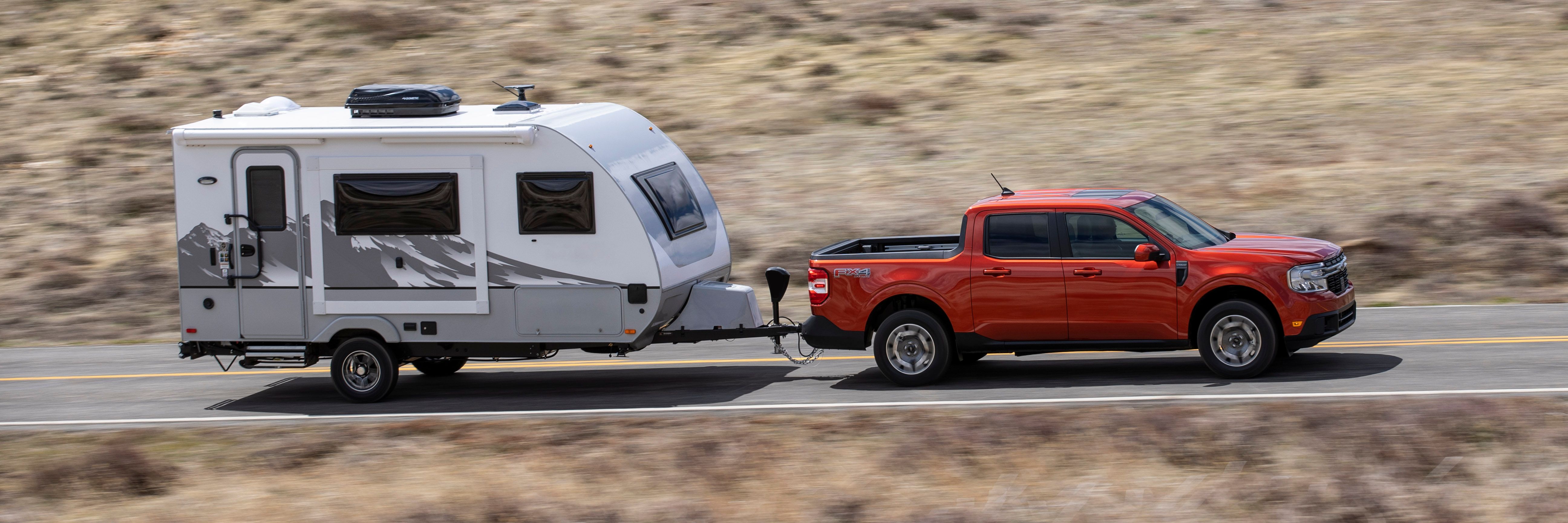 The 2022 Ford Maverick tows a trailer.