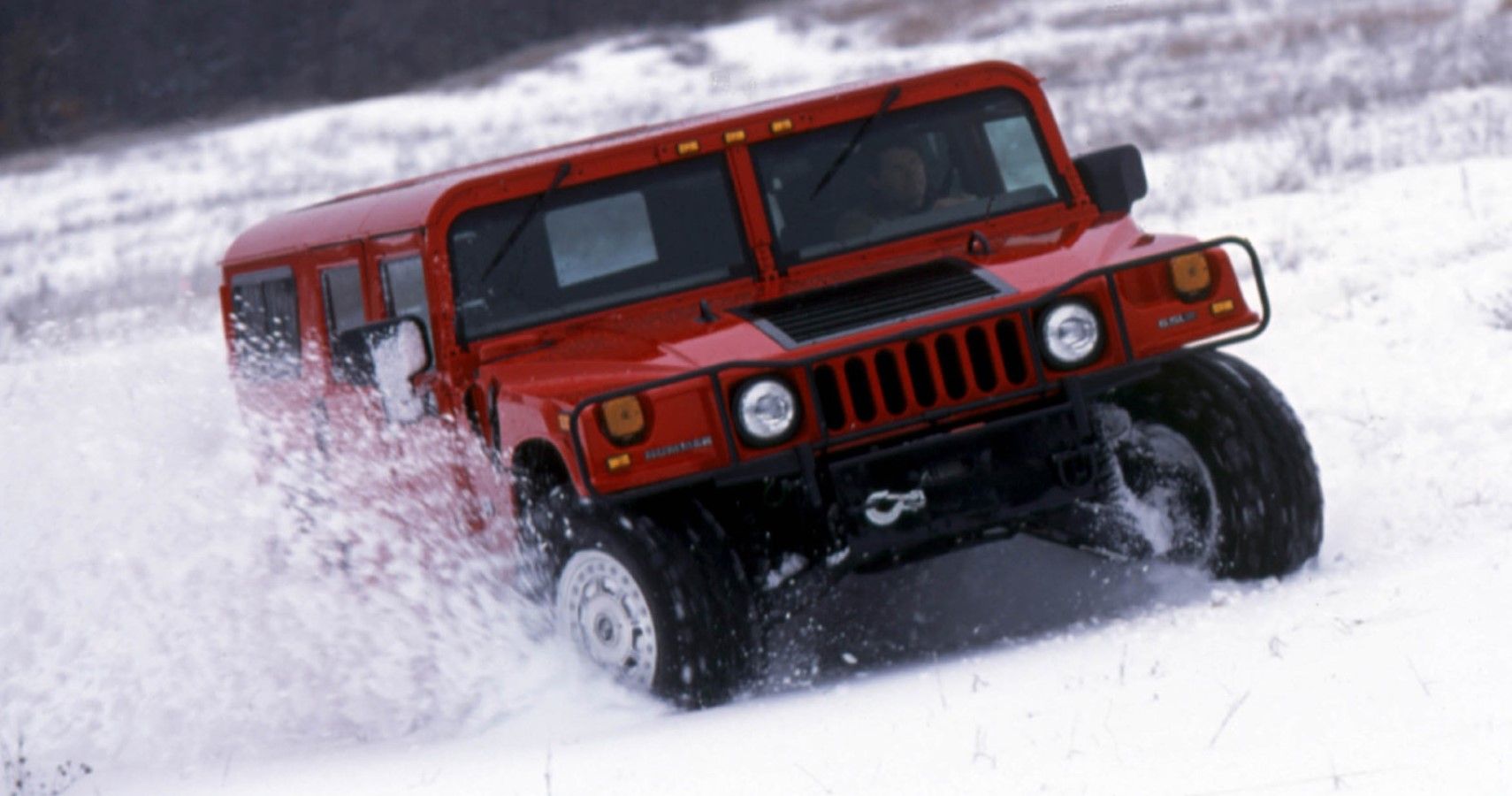 2002 Hummer H1 sliding in the snow