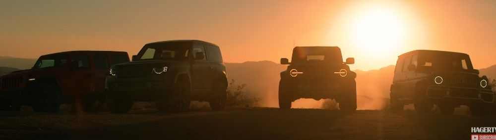 Jeep Wrangler, Land Rover Defender, Ford Bronco Raptor and Mercedes-AMG G63 during sunset
