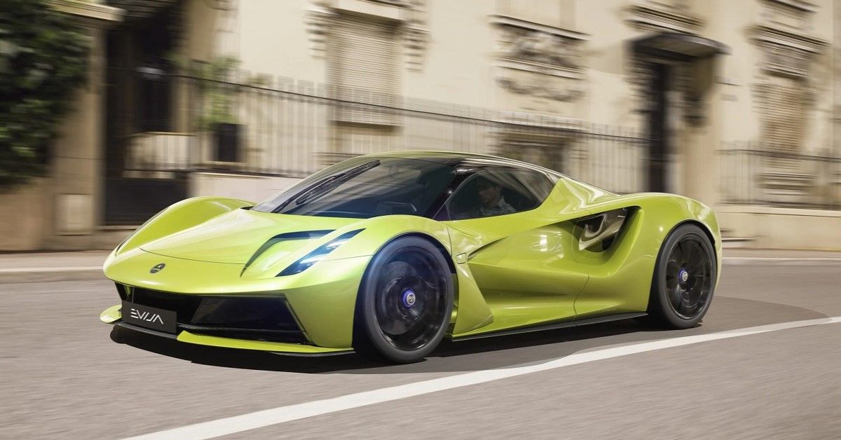 Lotus Evija, bright green, front quarter view on road at speed