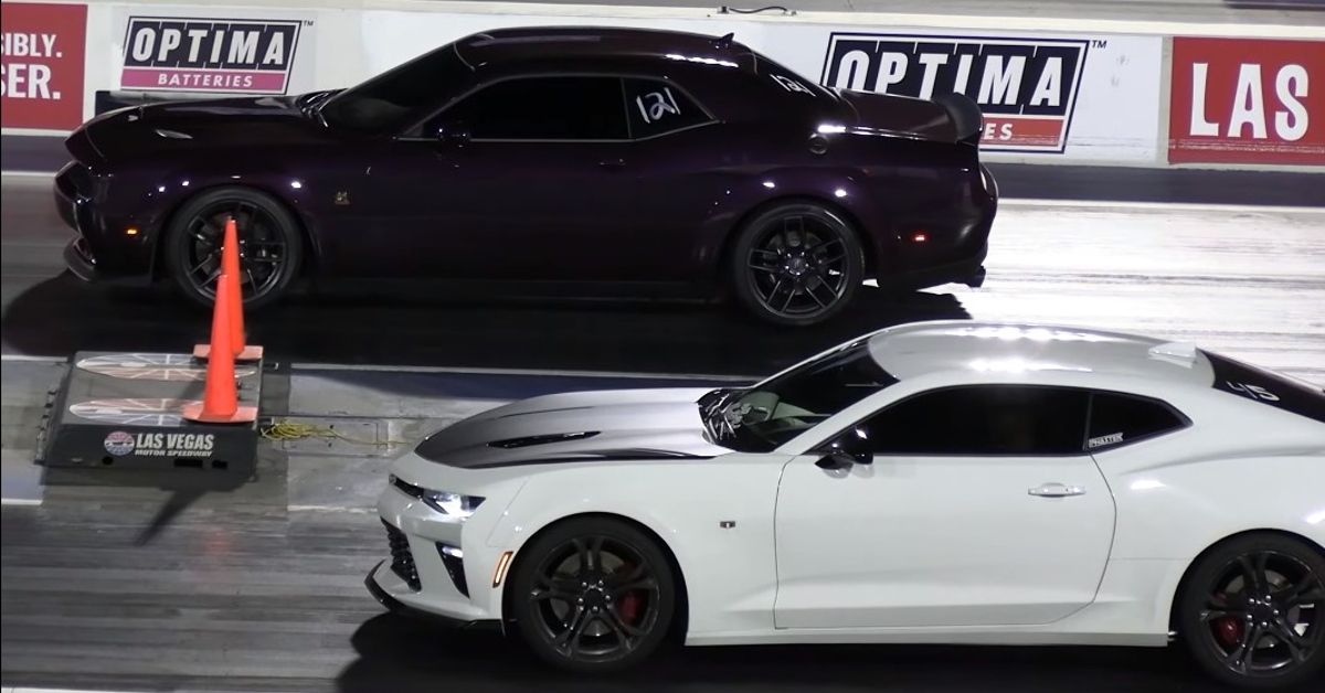 Wheels YouTube Channel Camaro SS VS Challenger Scat Pack Side view at track