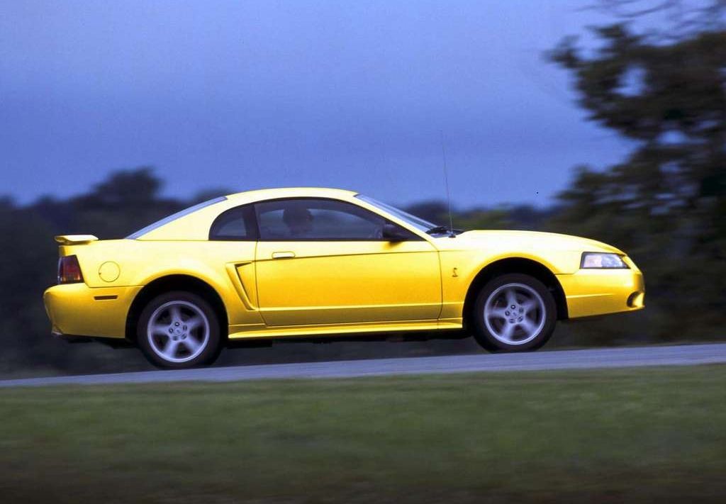 Yellow 2001 Ford Mustang SVT Cobra side 
