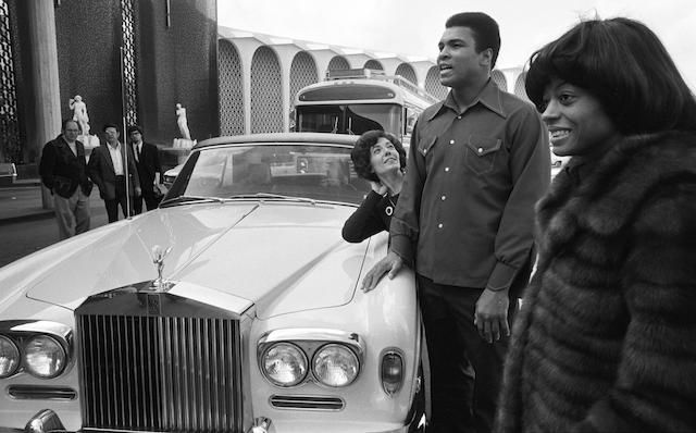 Muhammad Ali with his Rolls-Royce Silver Shadow
