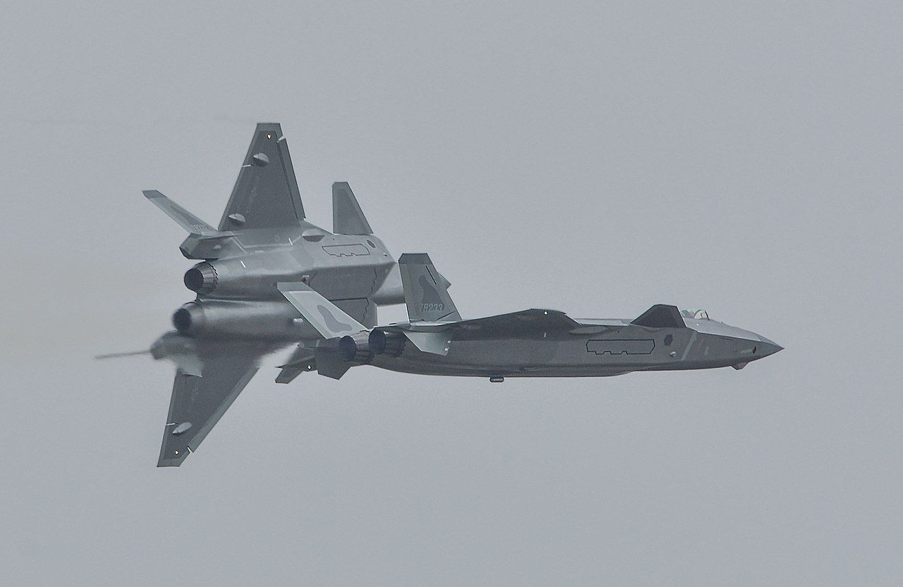 Two J-20 fighters breaking formation