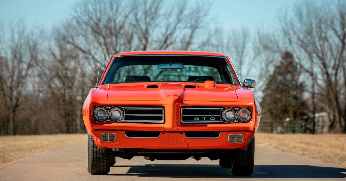 Orange 1969 Pontiac GTO Judge on the road