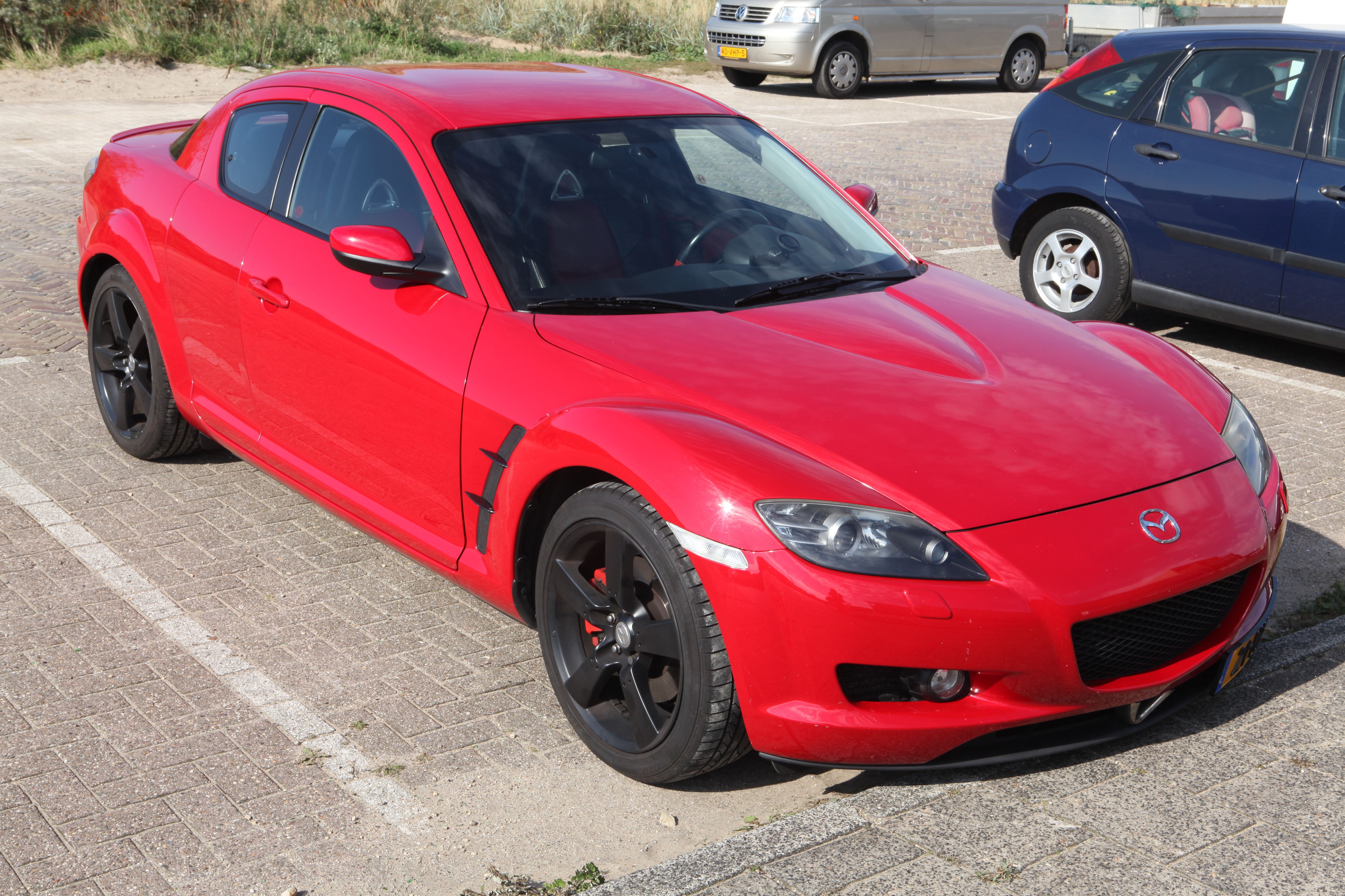 red 2004 Mazda RX-8 on the parking lot