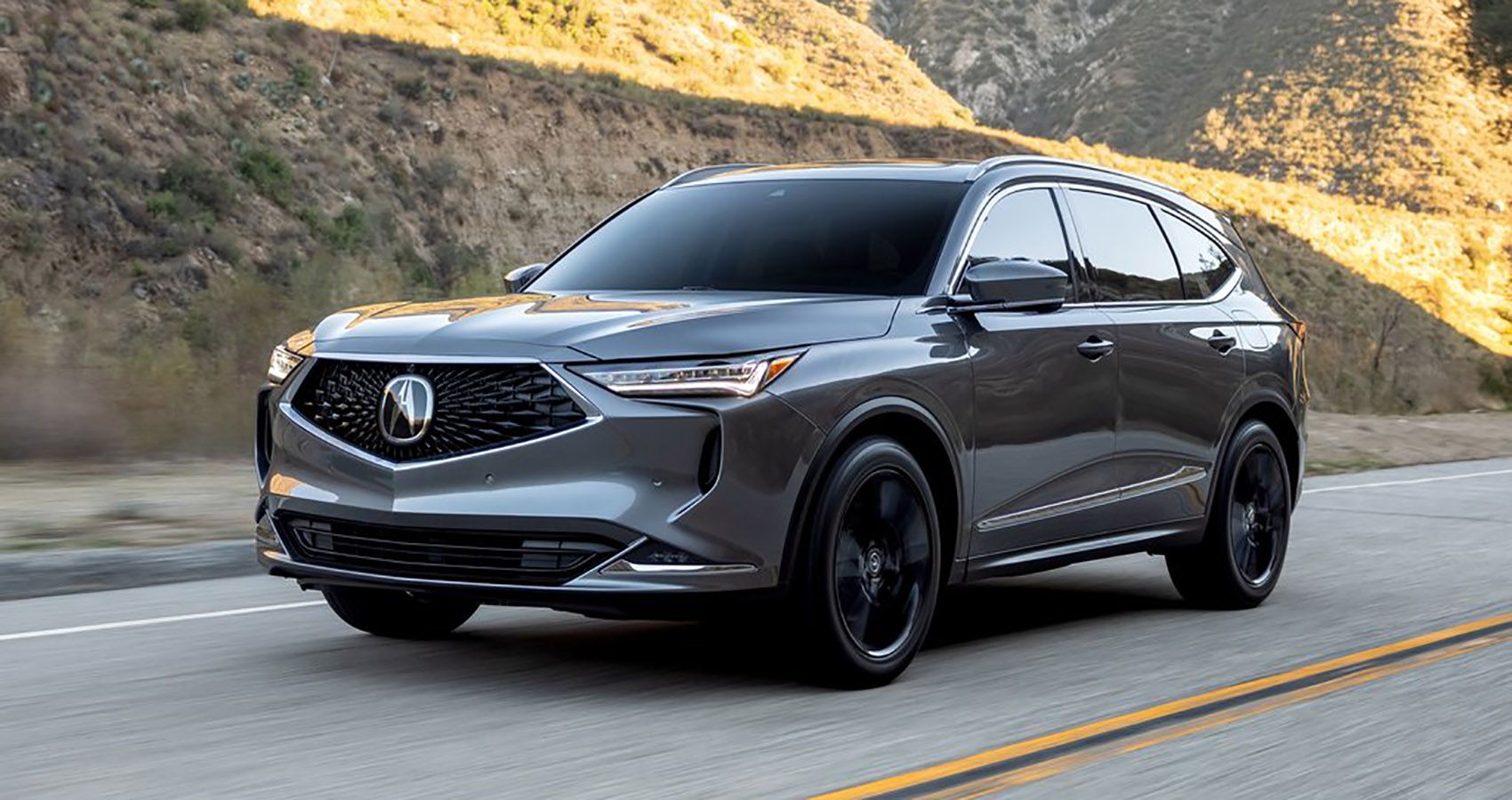 2022-acura-mdx-exterior-front-angle-on-road
