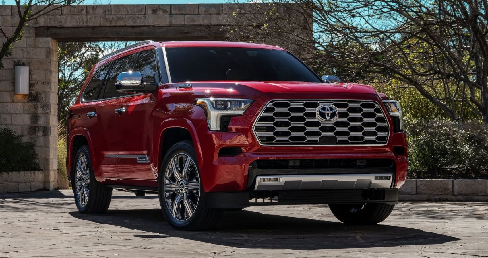 Red 2023 Toyota Sequoia Capstone parked