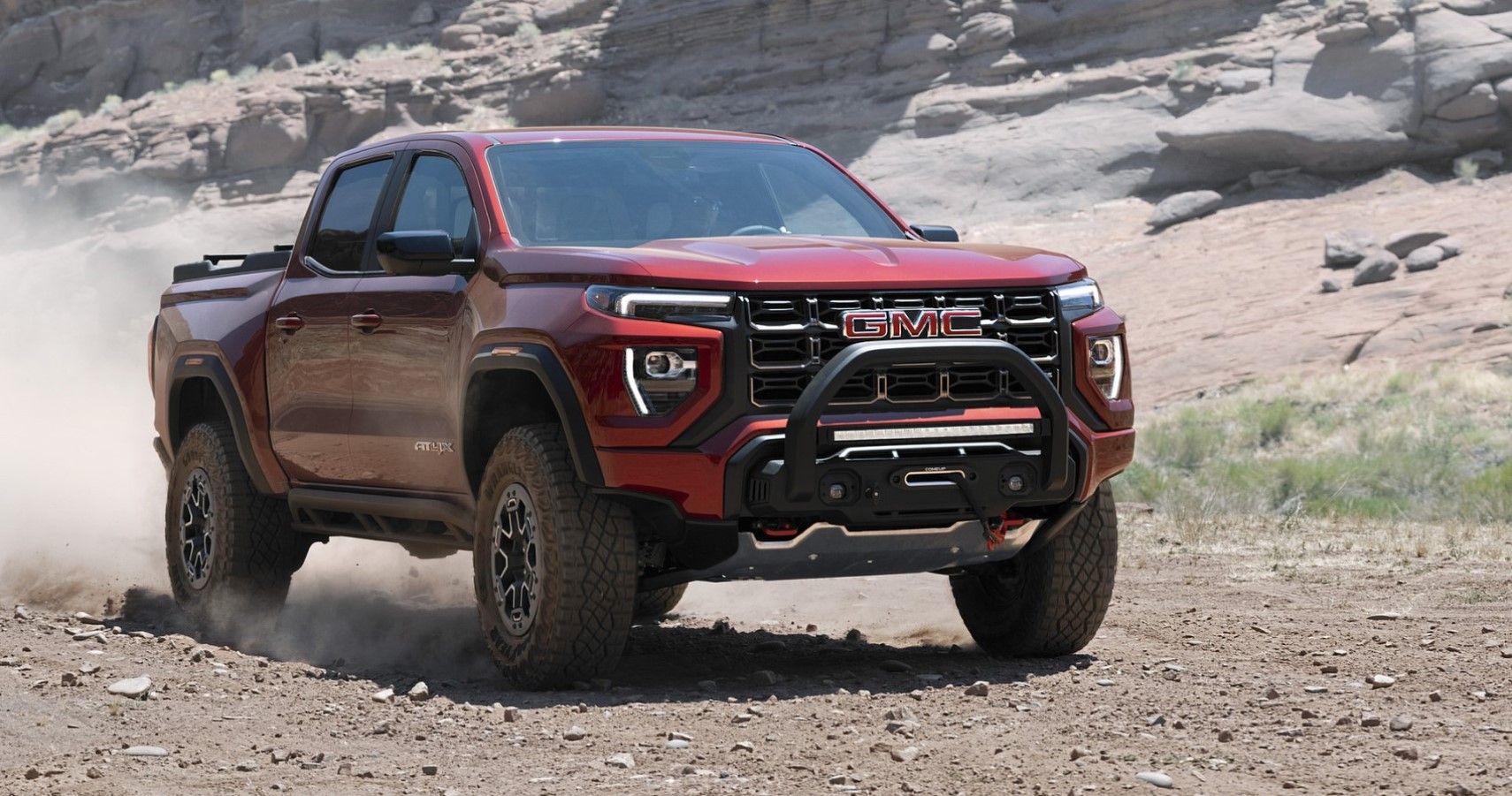 2023 GMC Canyon AT4X off-roading front third quarter view