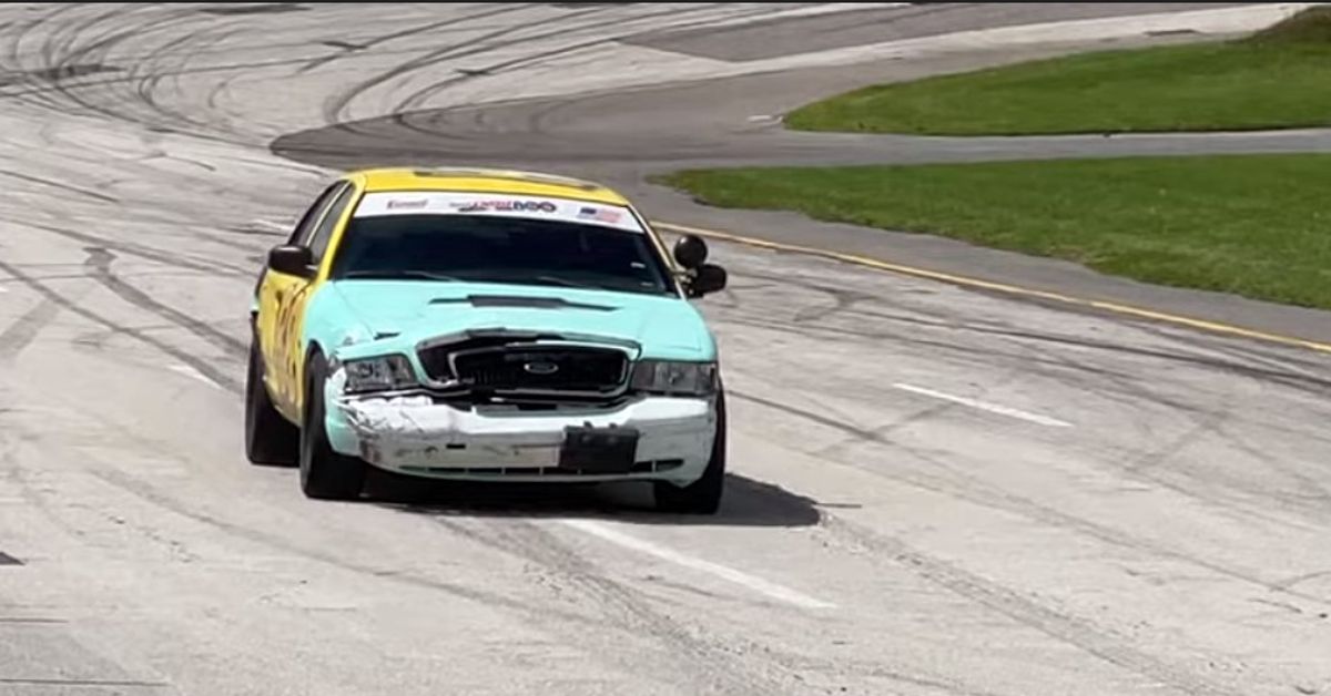 Cleetus McFarland YouTube Channel Crown Vic doing laps around Freedom Factory Track