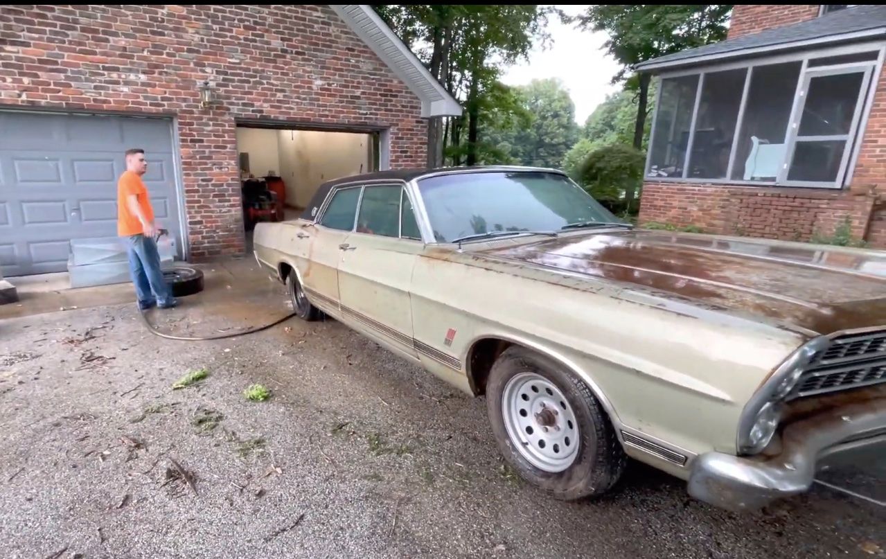 Ford LTD, front, being washed