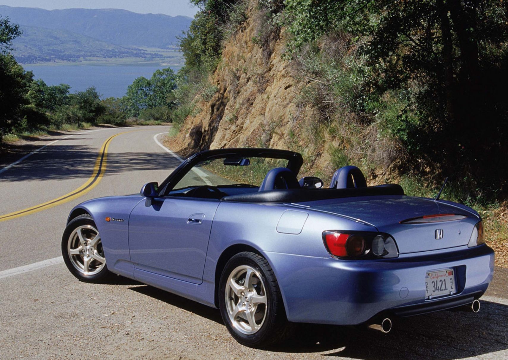 Honda S2000-2002 rear view parked in blue