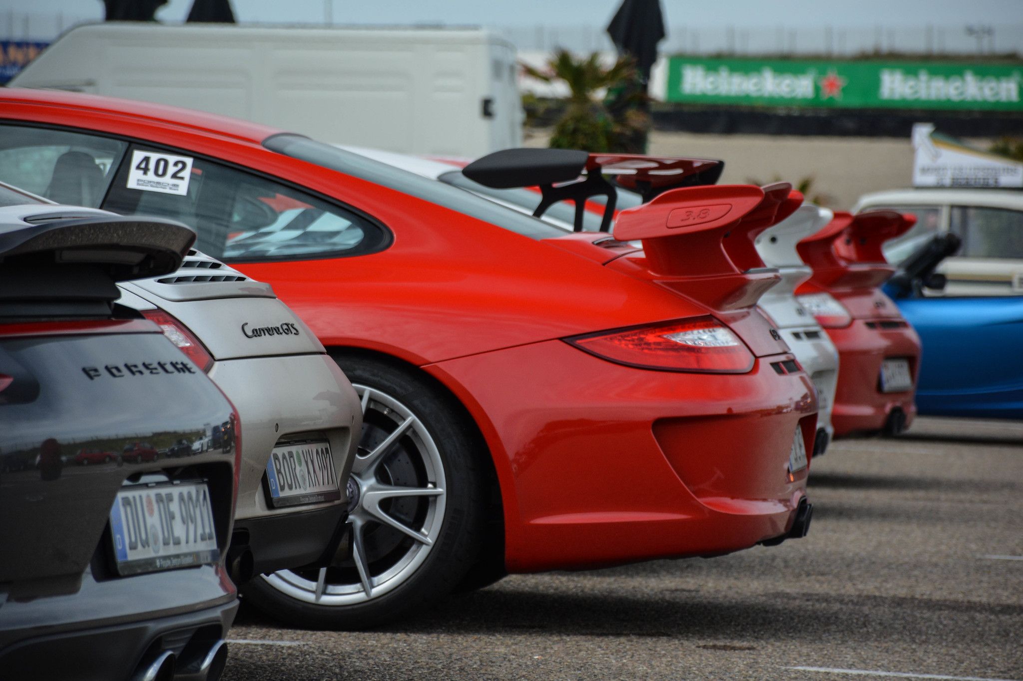 Cool Porsche sports cars in a parking lot