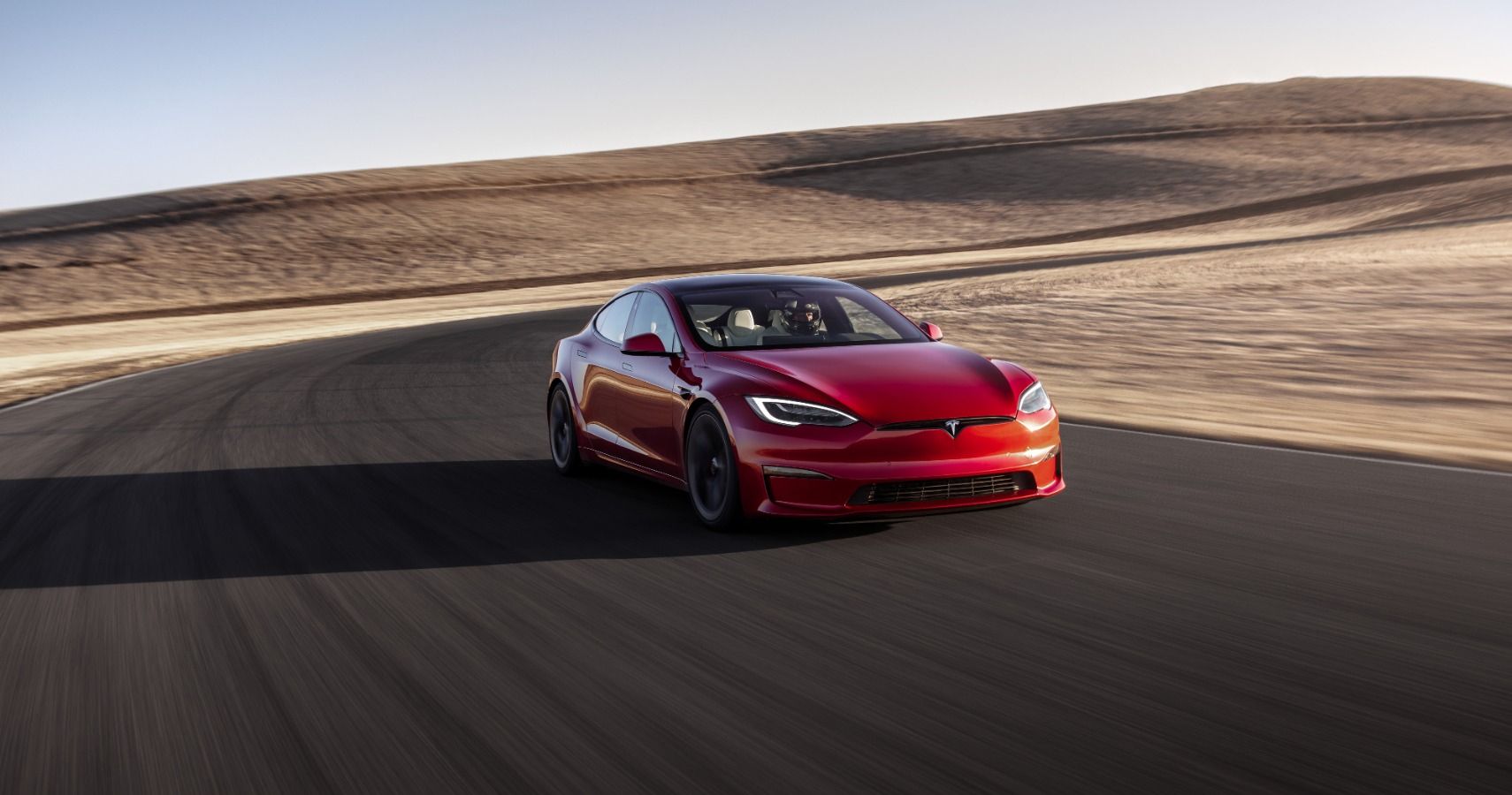 Red Tesla Model S Speeding On A Track