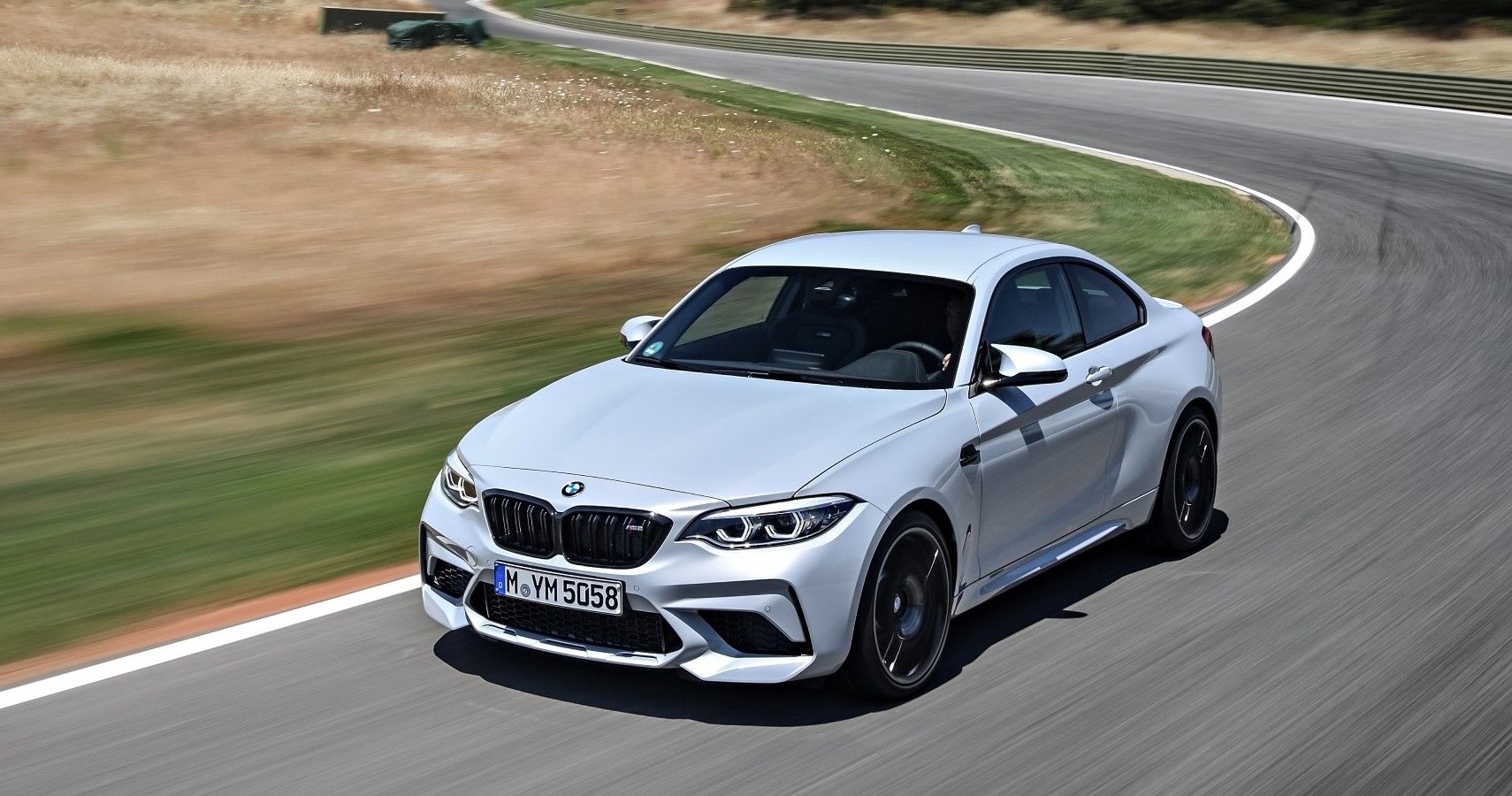 BMW M2 Competition accelerating on the racetrack