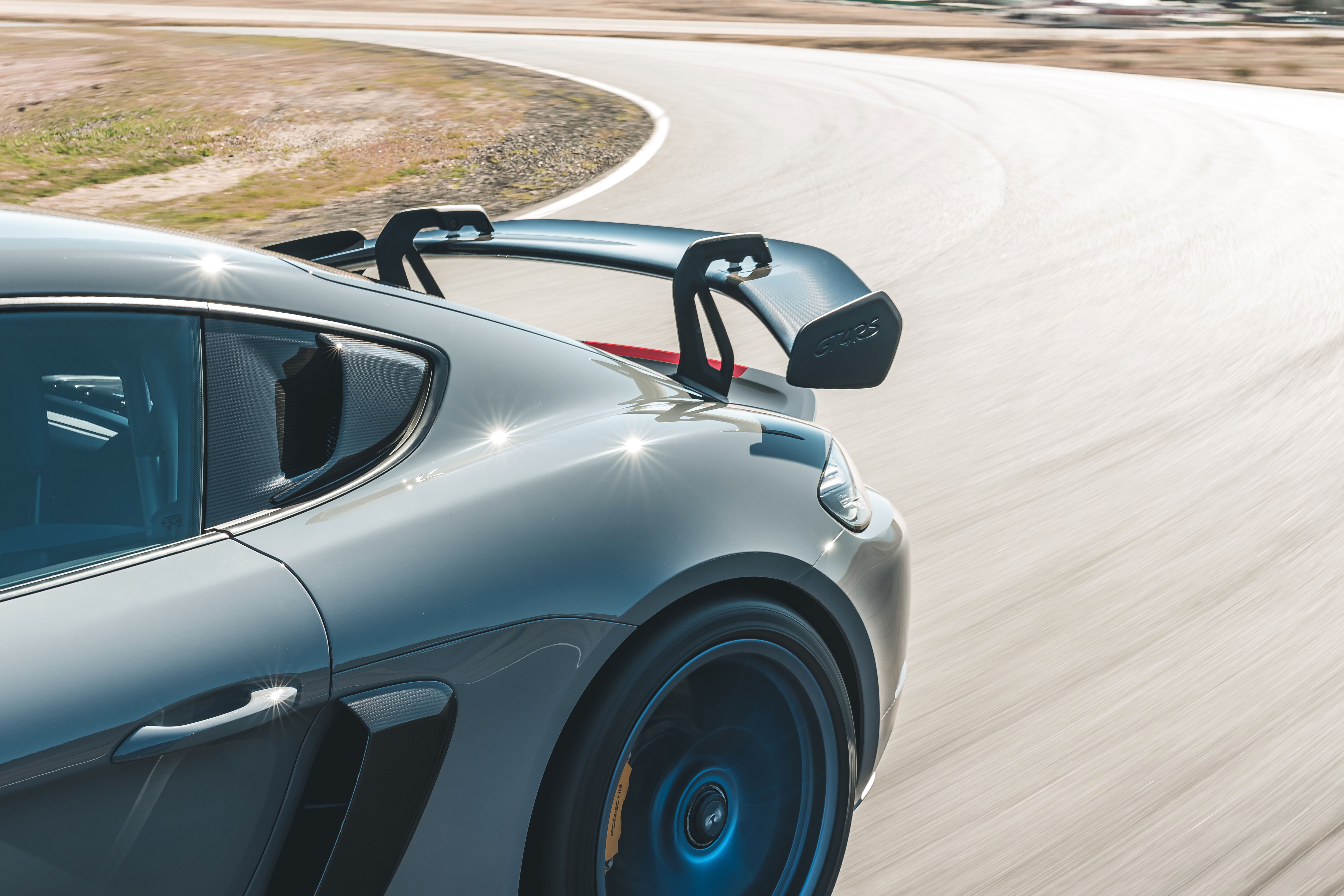 The rear wing of the Porsche Cayman GT4 RS.