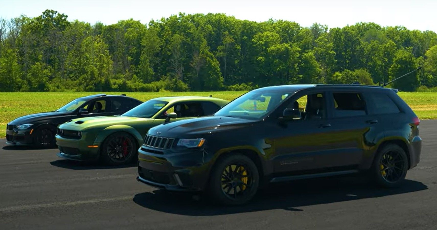 Watch A Stock Dodge Challenger Hellcat Come To Blows With A Tuned BMW And Jeep Trackhawk