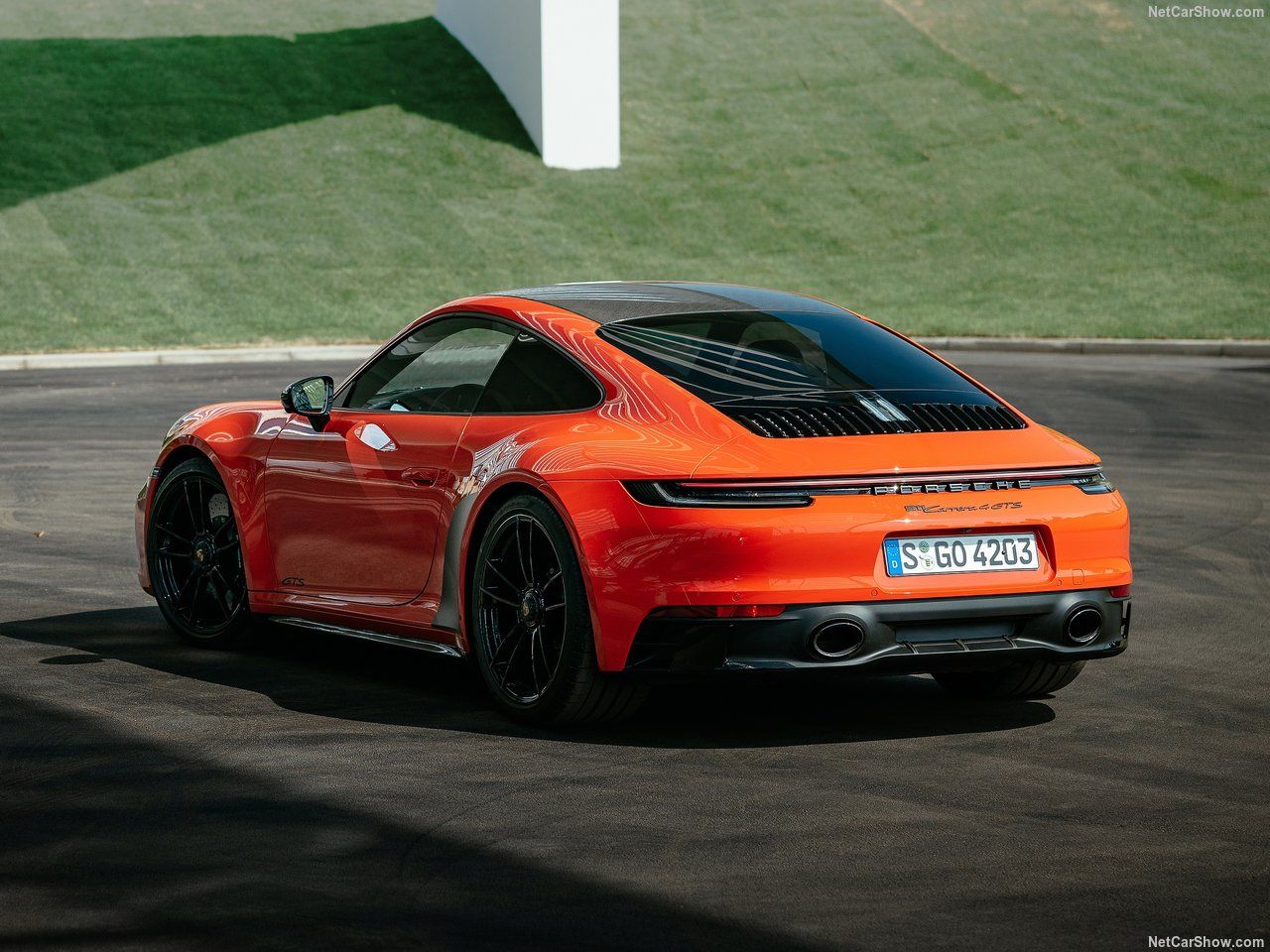 Orange 2022 Porsche 911 Carrera 4 GTS Parked Outside