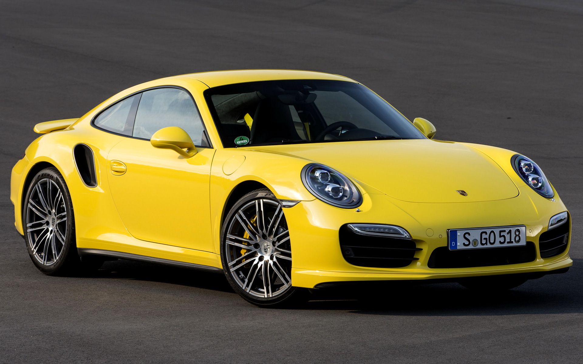 The 2013 Porsche 911 Turbo on the track. 