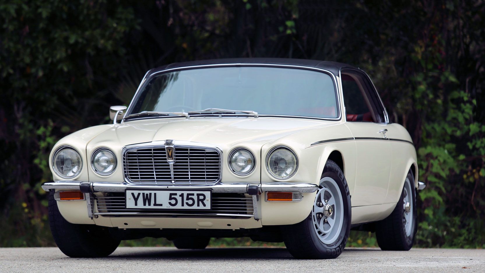 White 1976 Jaguar XJ12C on the driveway