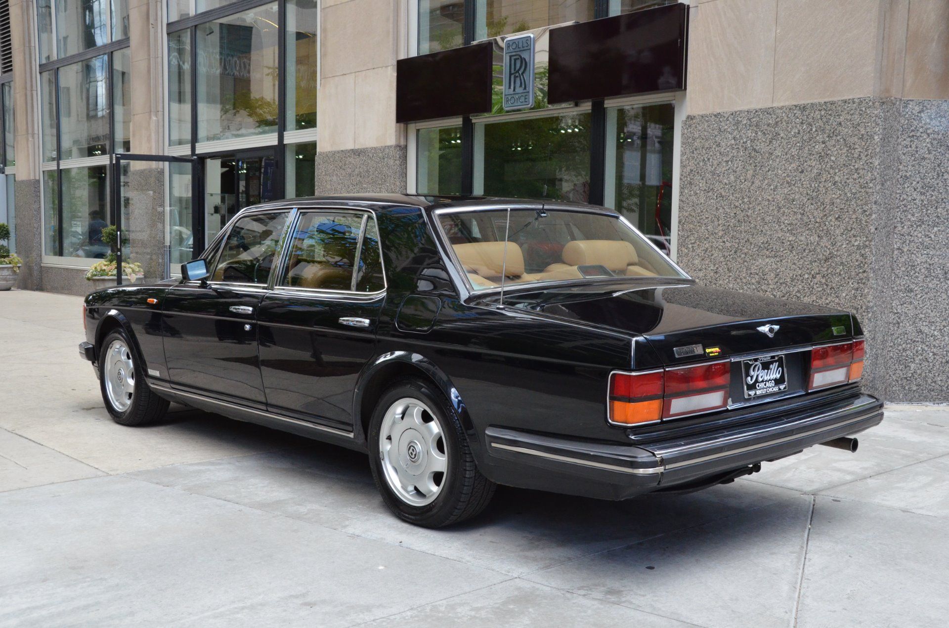 Black 1989 Bentley Eight on the road