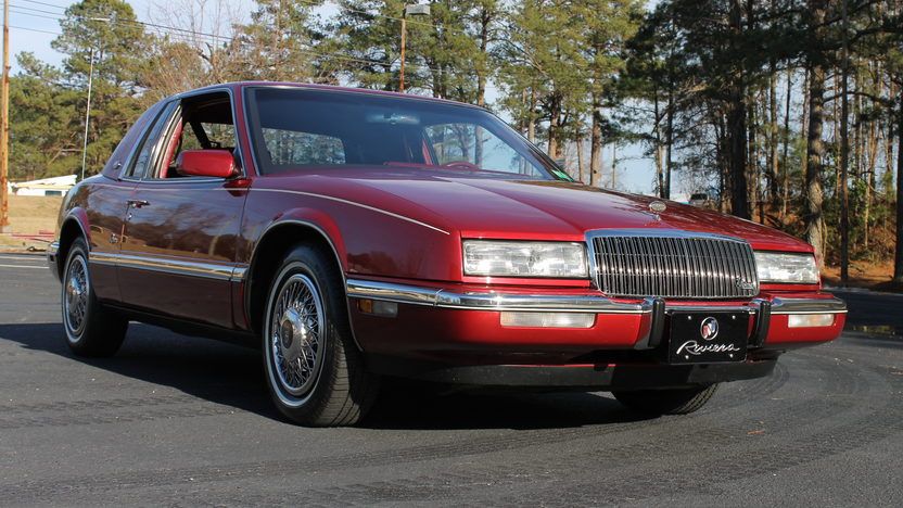 Red 1989 Buick Riviera on the driveway