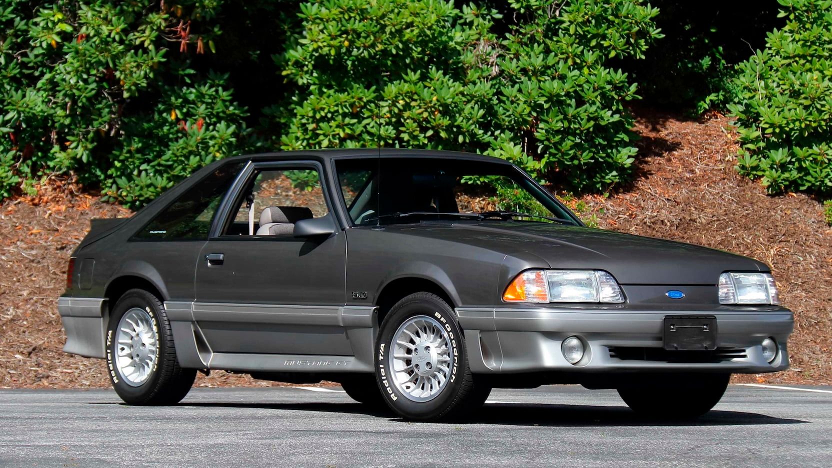 Gray 1990 Ford Mustang 5.0 GT on the road