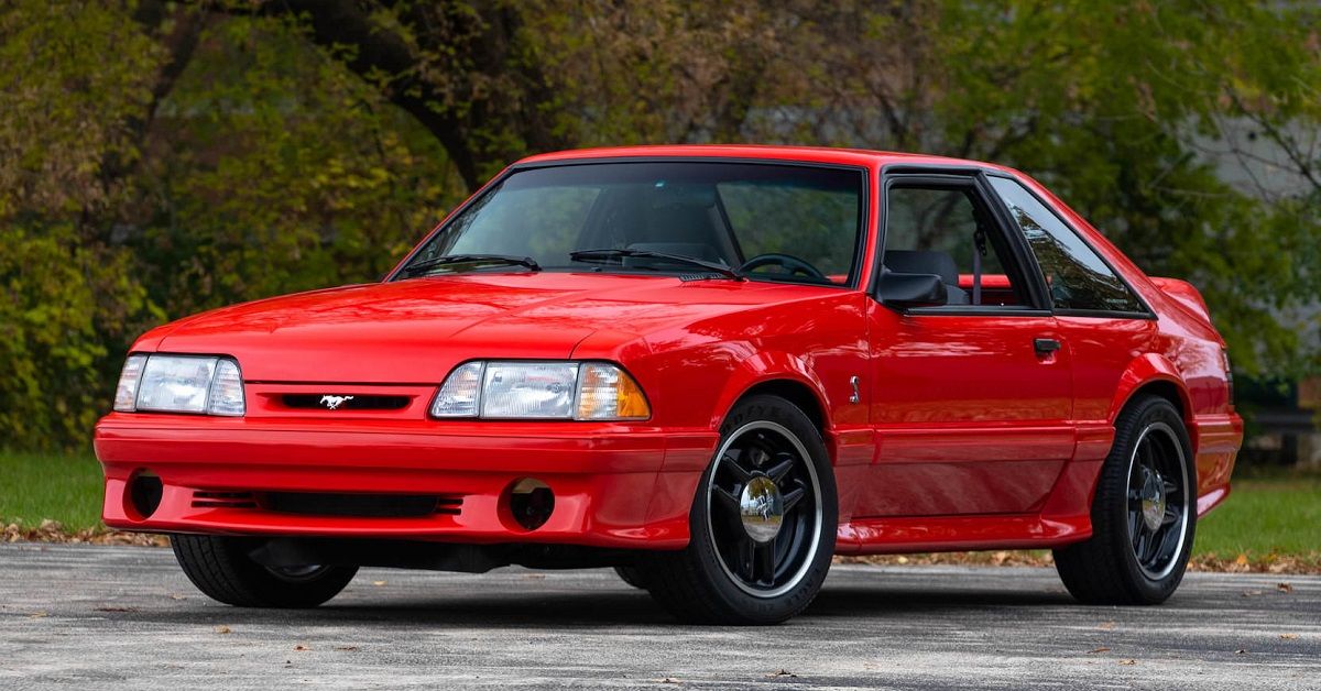 Red 1993 Ford Mustang SVT Cobra R Parkedd Outside