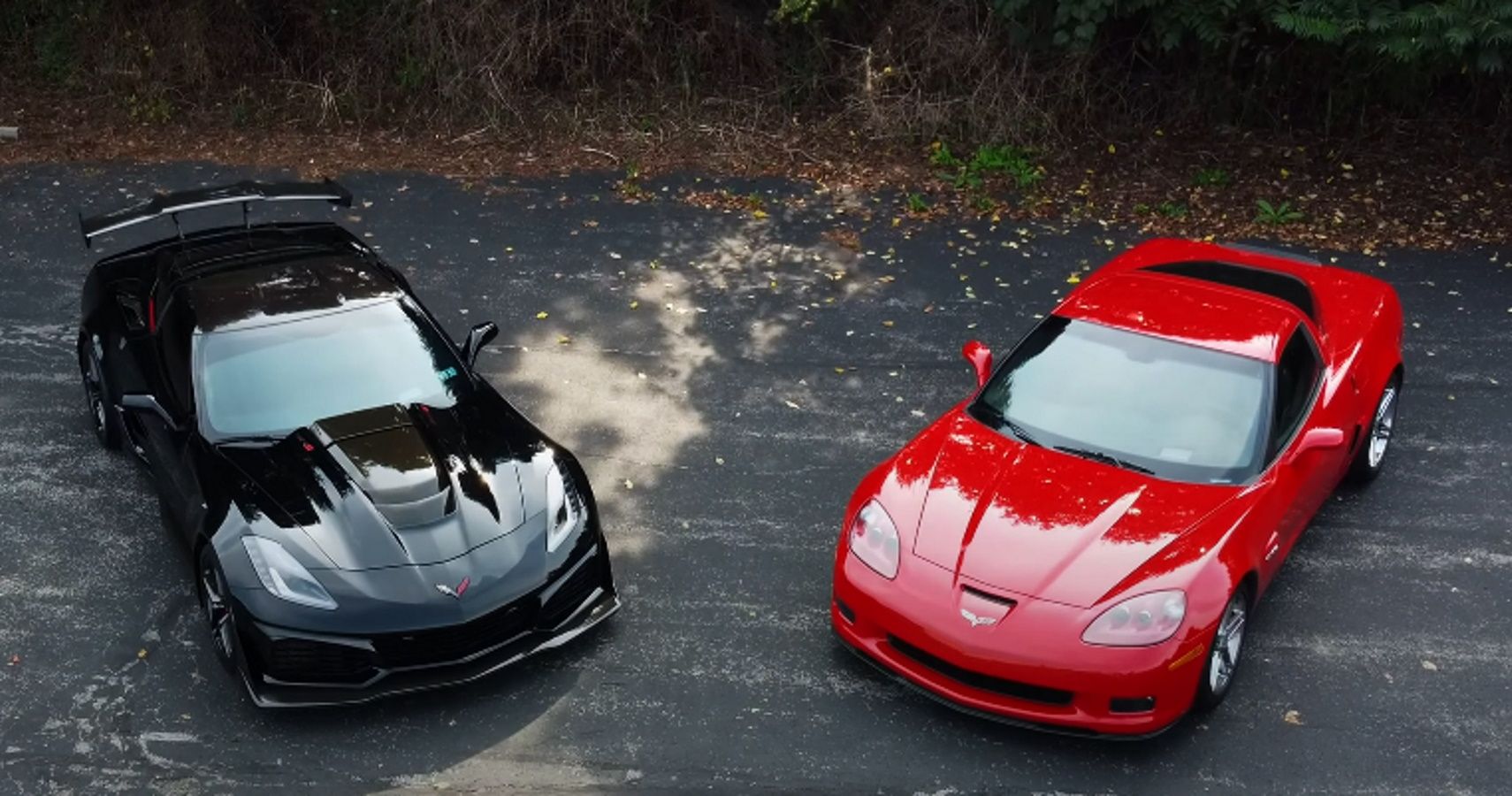 A 2019 Corvette ZR1 in black and a 2008 Corvette Z06 in red
