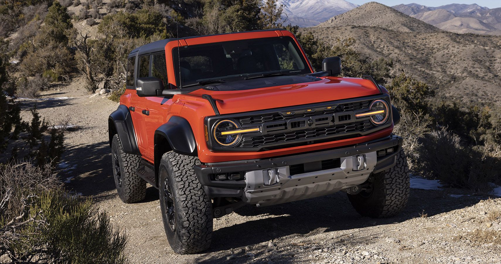 red 2022 Ford Bronco Raptor in the mountains