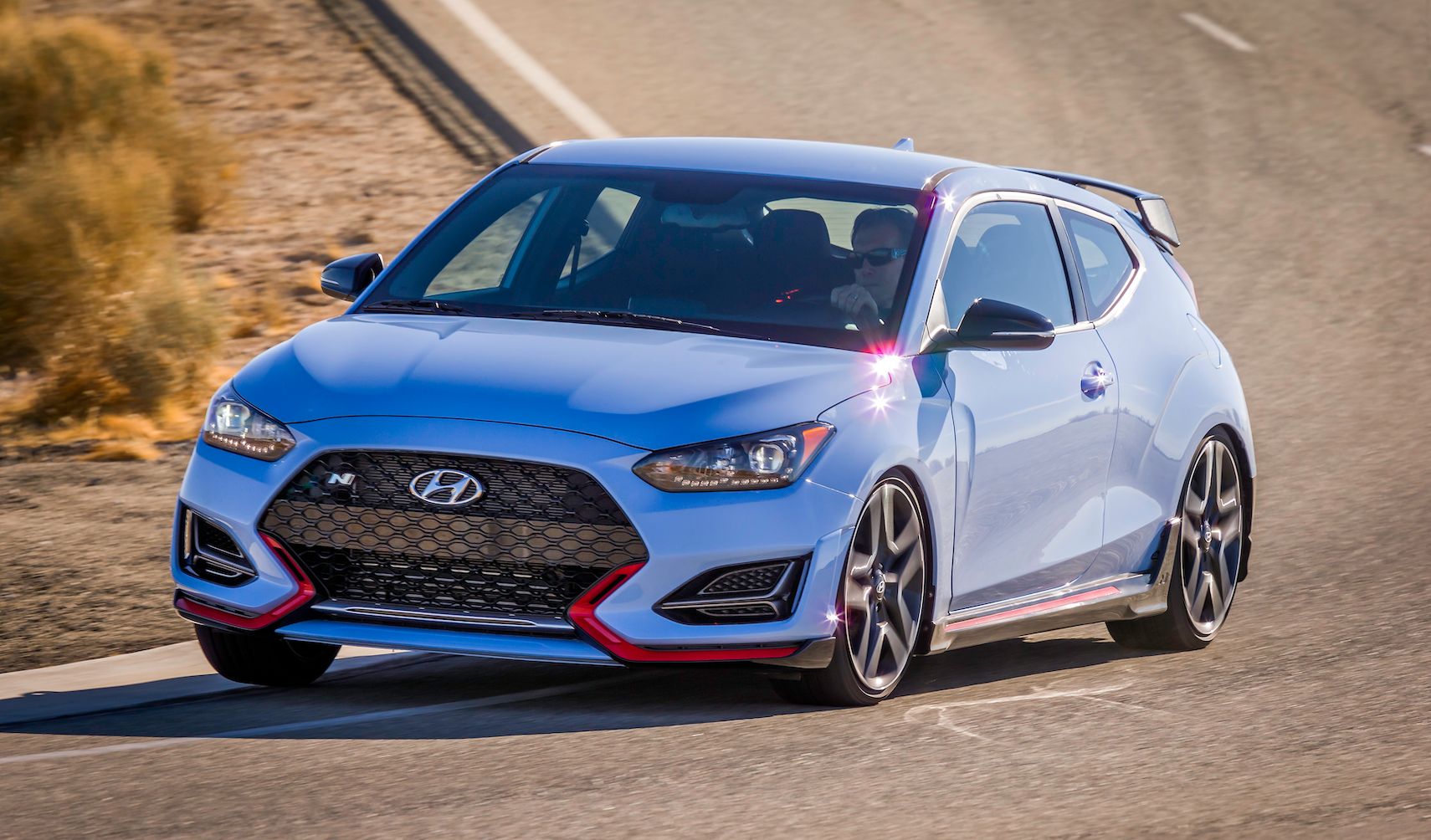 Blue Veloster N Hatch on the road