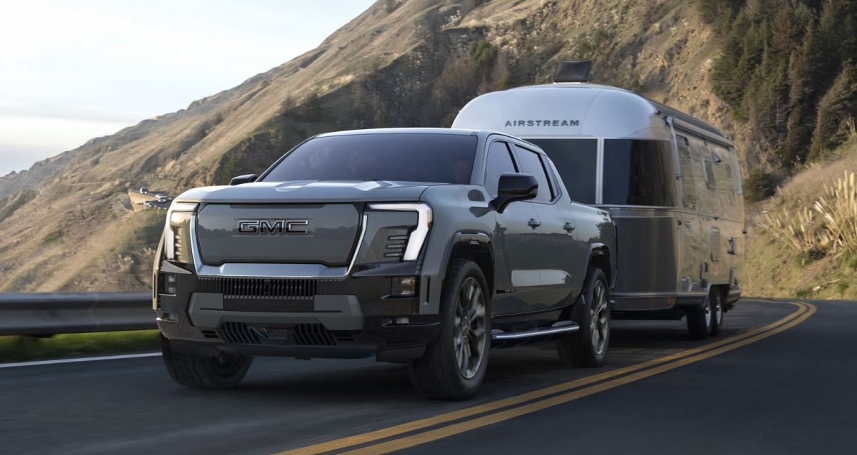 2024 GMC Sierra EV Denali towing a trailer