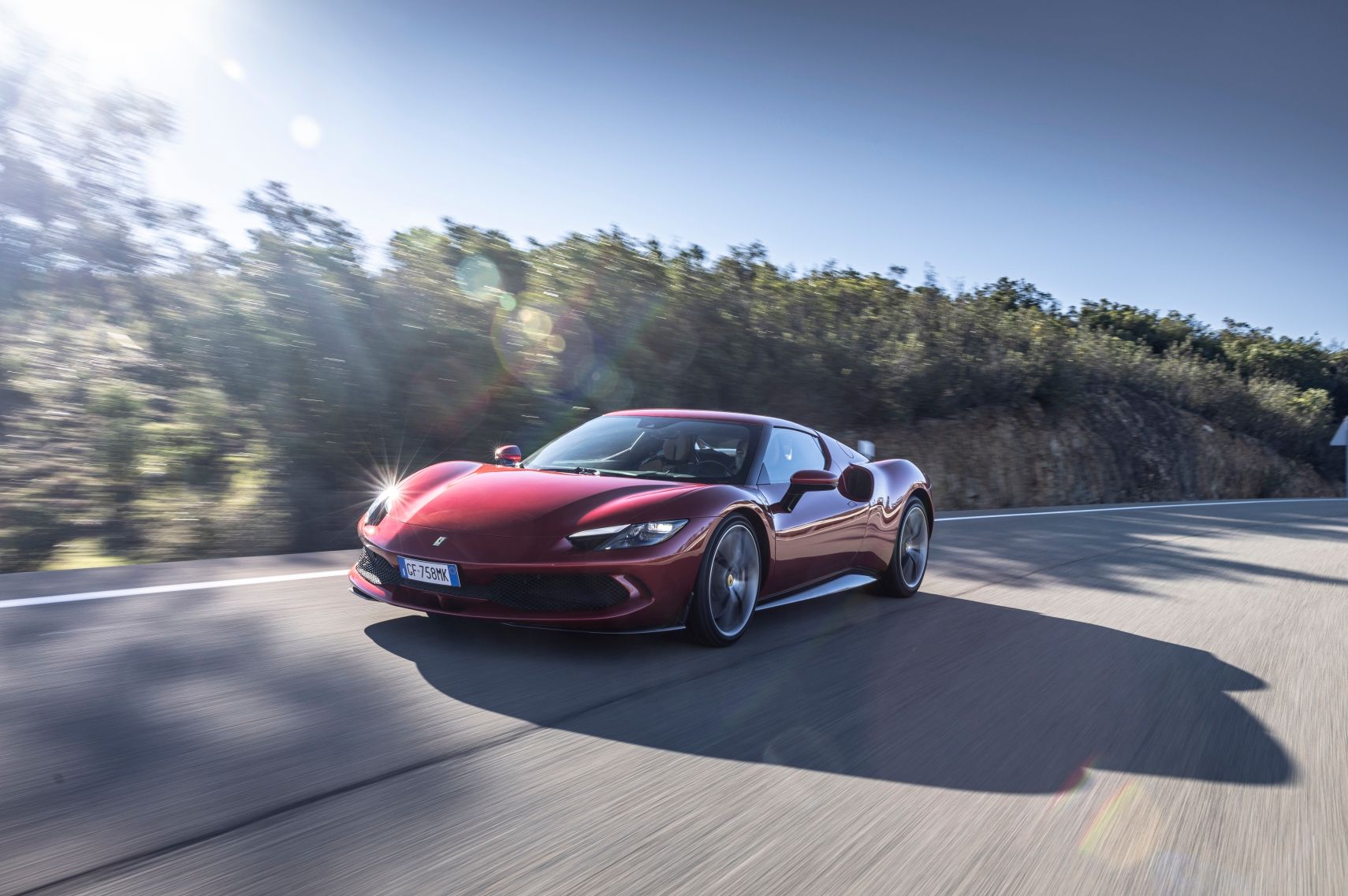 2022 ferrari 296 gtb front view driving