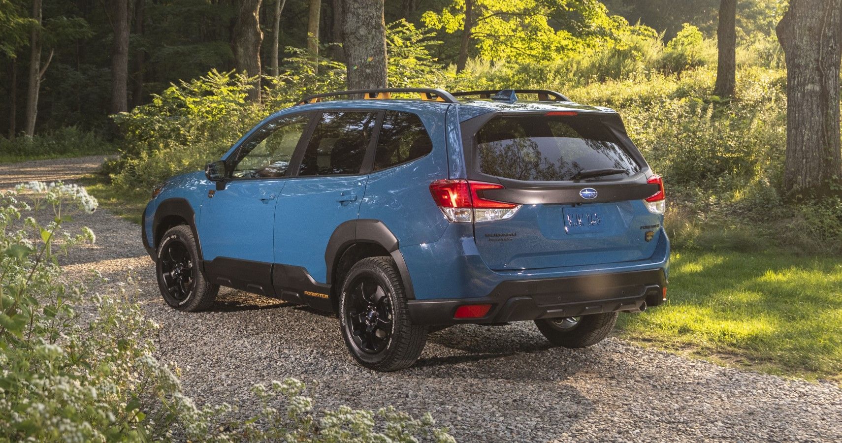 2023 Subaru Forester rear third quarter view in the woods