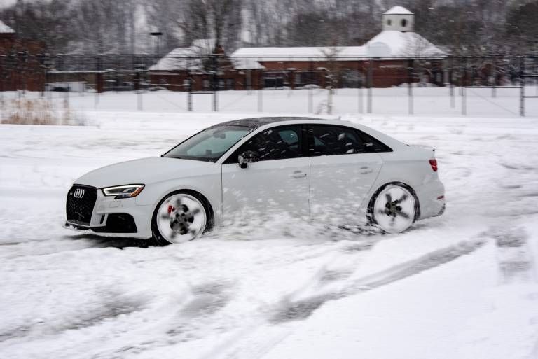 White Audi RS3 Sedan In Snow