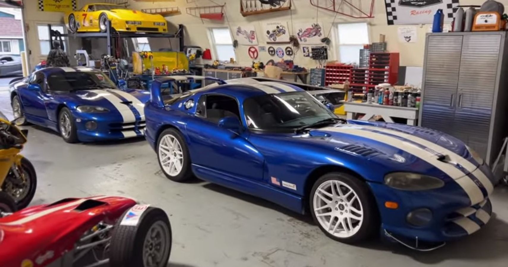 Casey Putsch YouTube Channel  two 1997 Dodge Viper GTS' side view in the Genius Garage