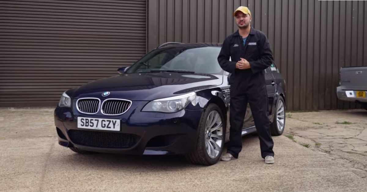 DRIVETRIBE YouTube Channel Mike next to fixed BMW M5 