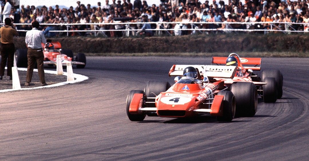 Red Ferrari 312B2 on the track