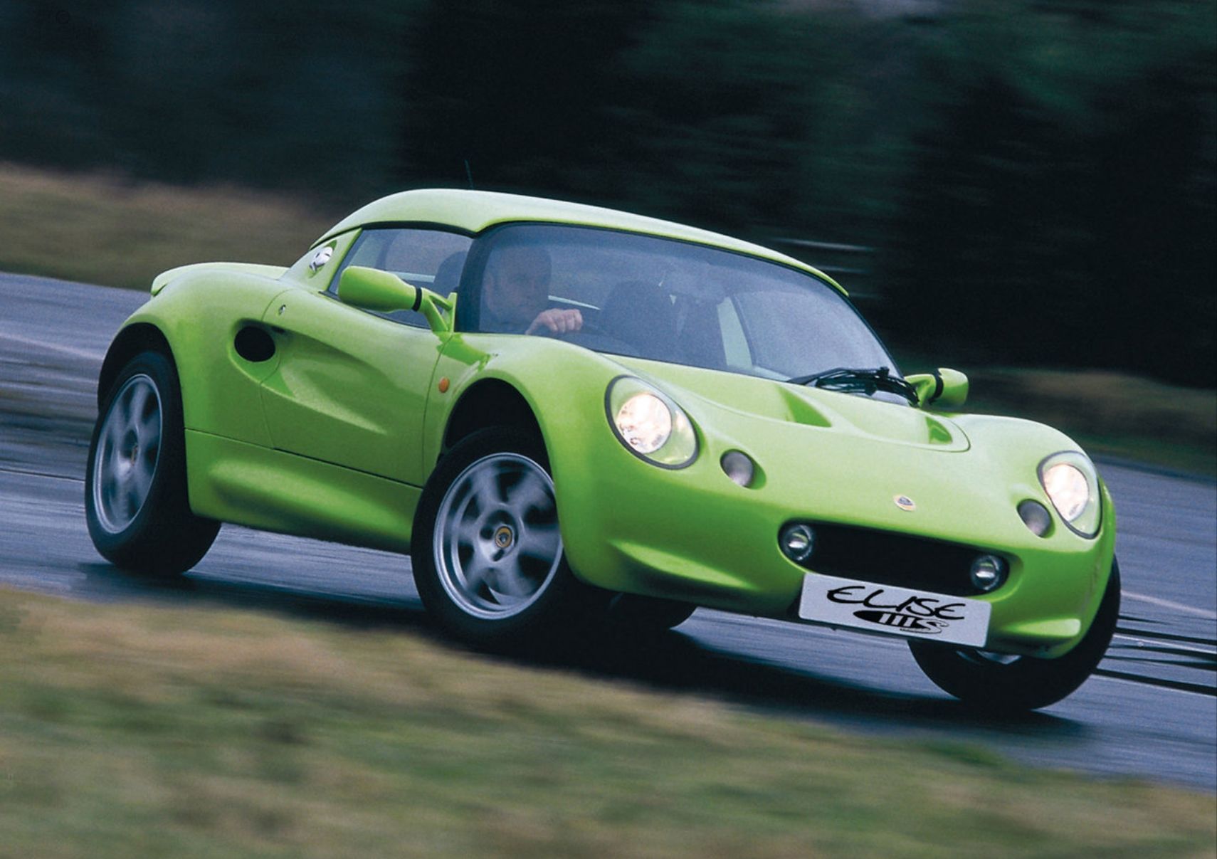 1999 Lotus Elise Series 1 Front Quarter View Green On A Racetrack