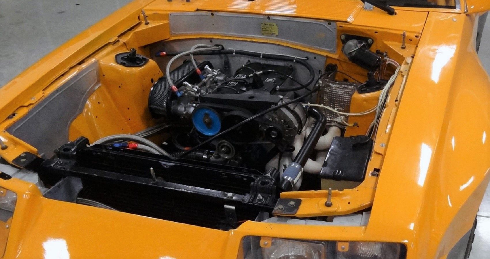 Orange Ford Mustang McLaren M81 engine bay