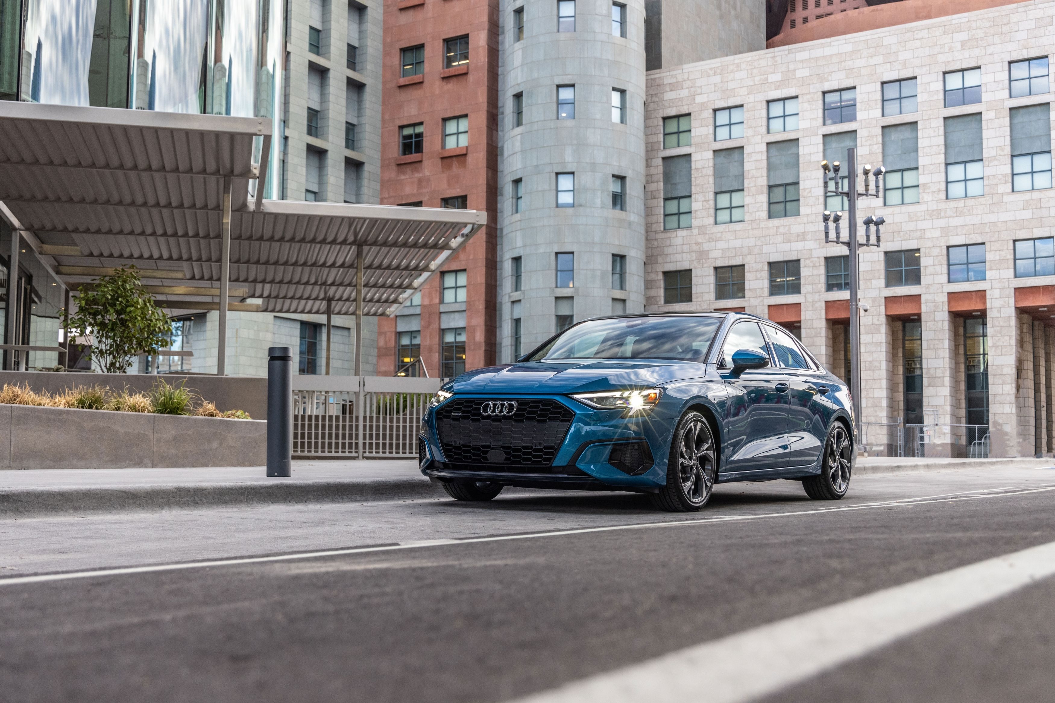 The 2022 Audi A3 drives through the city.