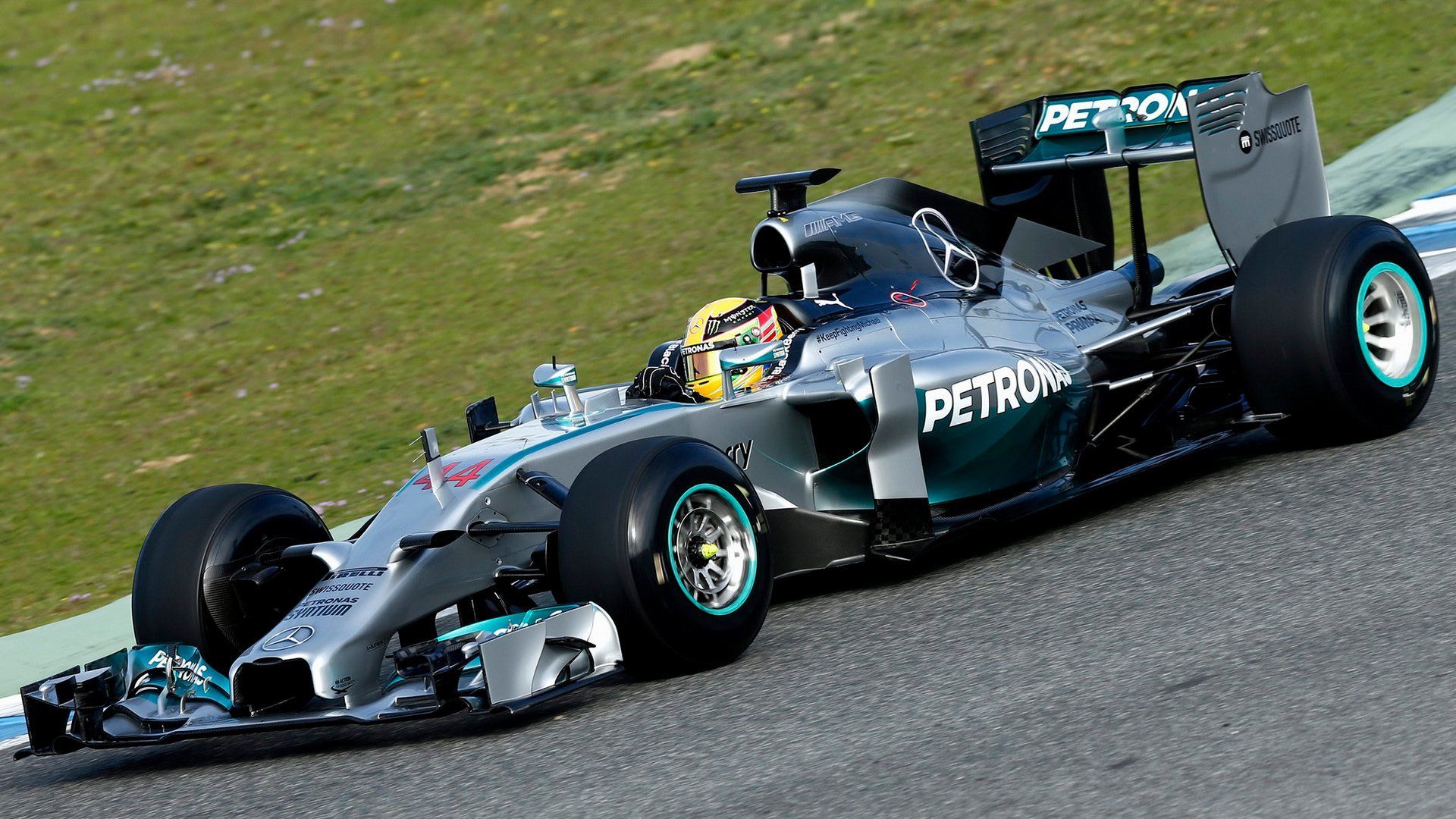 Green Mercedes F1 W05 Hybrid on track