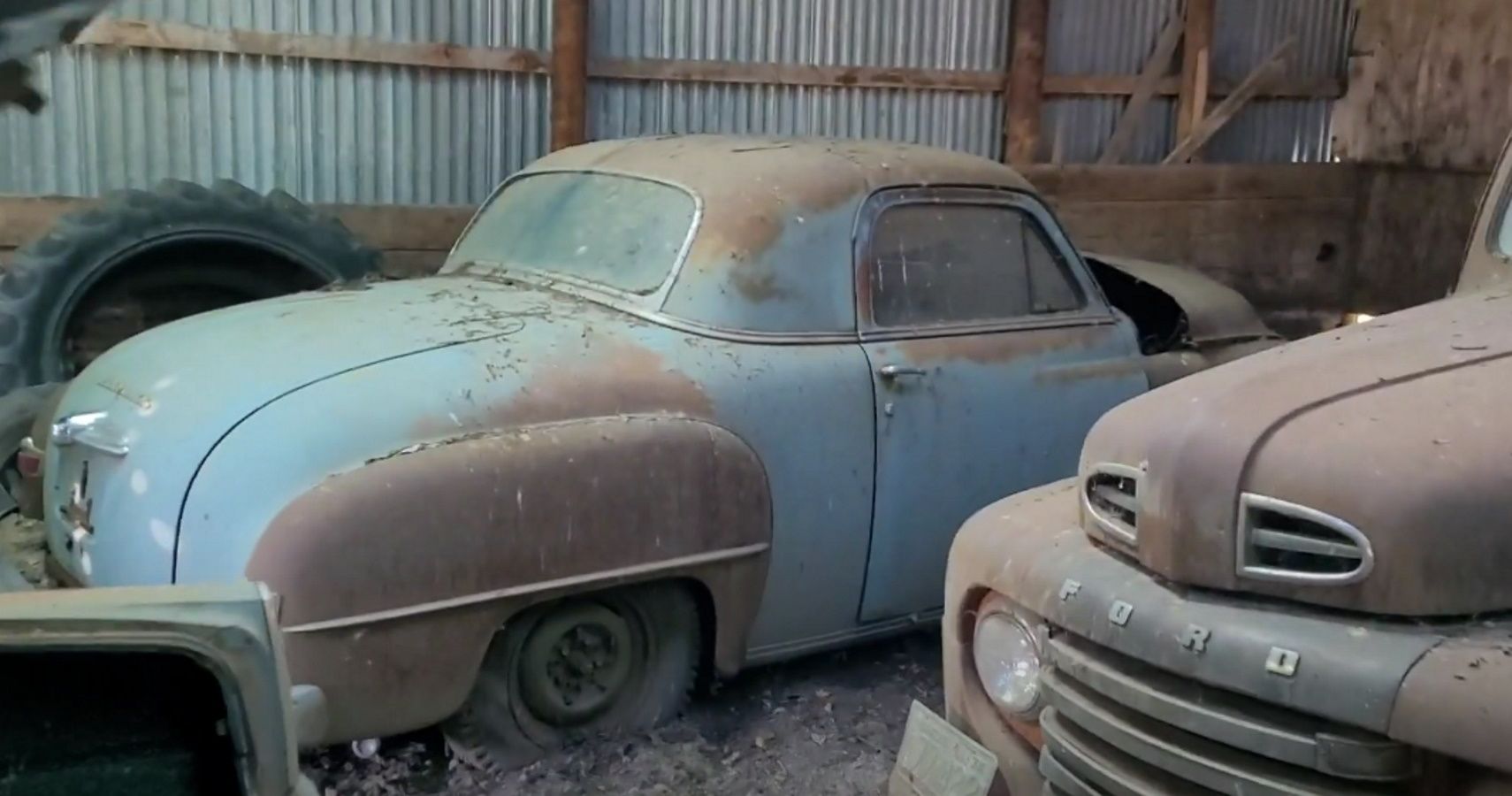 A Plymouth and Ford in this North Dakota Barnfind