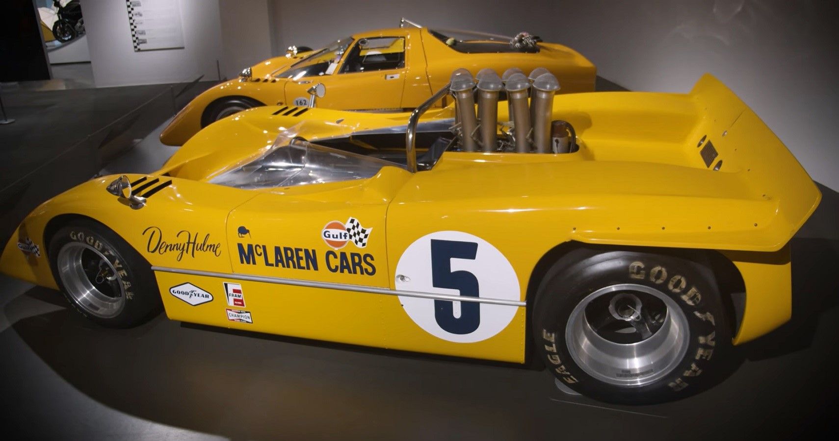 Petersen Automotive Museum McLaren Papaya racecars, side