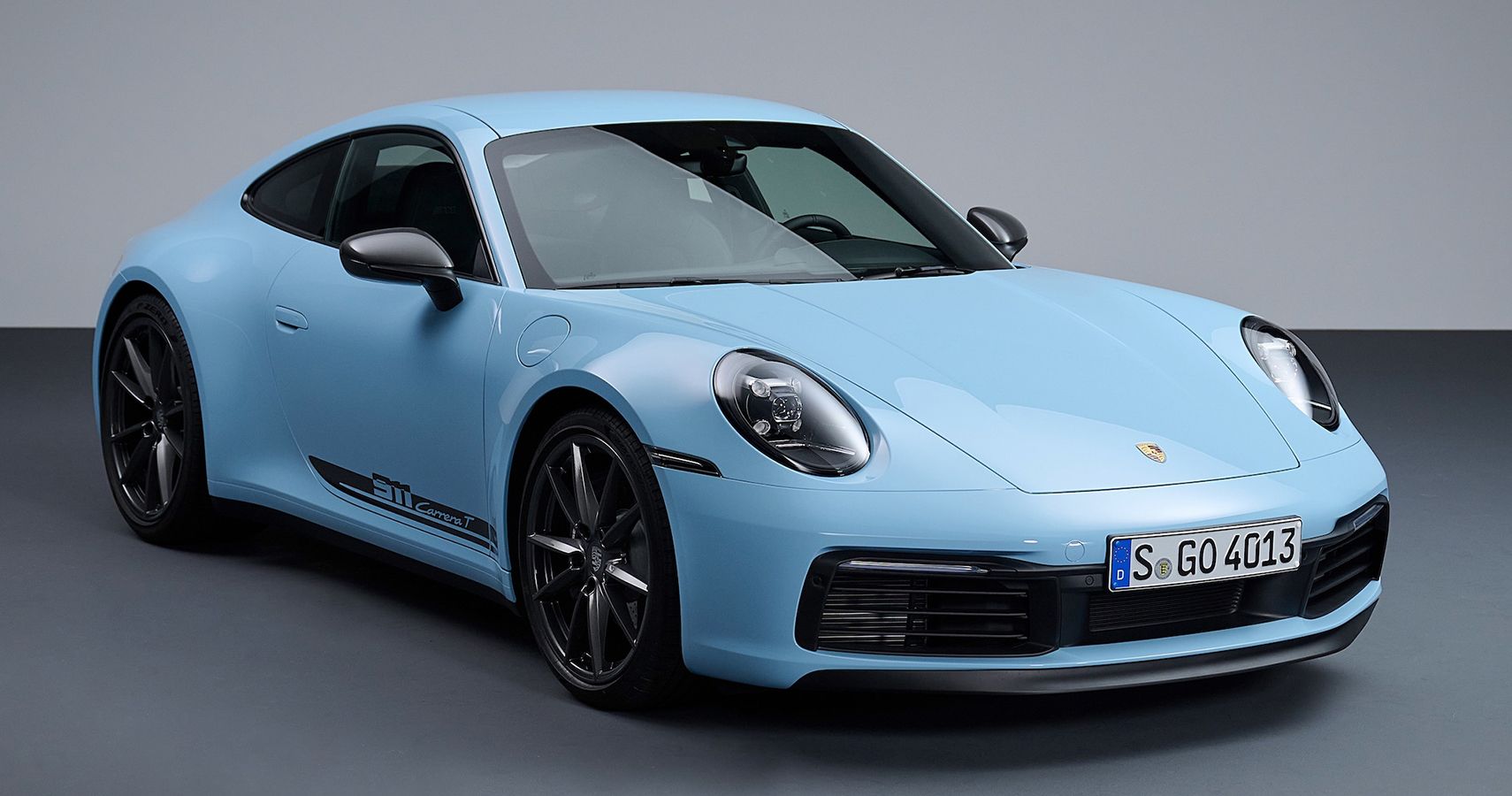 blue Porsche 911 Carrera T studio quarter front